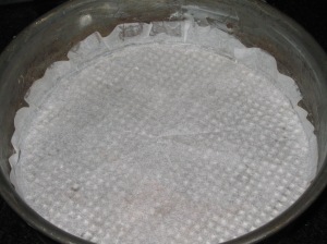 line base of tin with parchment